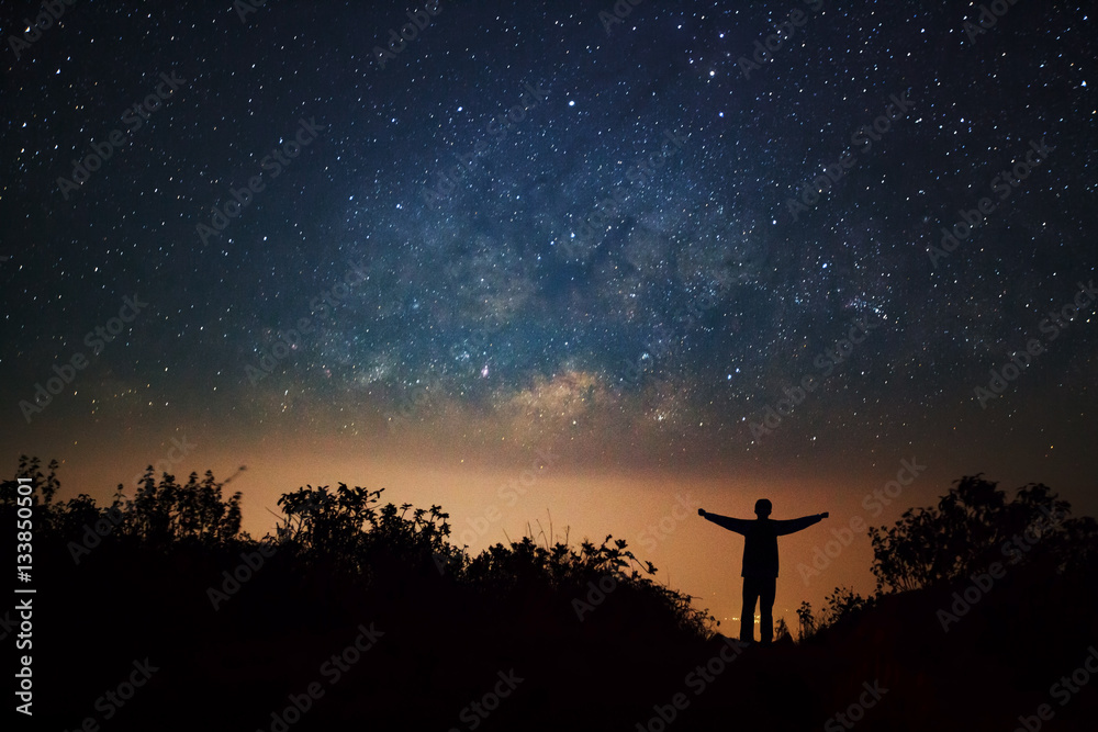 milky way galaxy and silhouette of a standing happy man on Doi L Stock ...