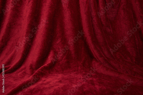 Fotografía Velvet red drapped curtain cloth full frame