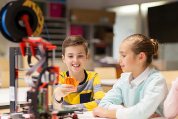 Wall Mural - happy children with 3d printer at robotics school