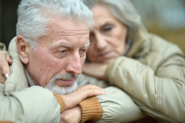 Poster - Thoughtful senior couple