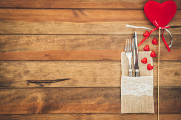 Wall Mural - Rustic romantic table setting over wooden background. Top view 