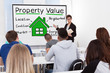© Andrey Popov - Male Teacher Teaching Property Value To Students