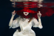 Girl In Red Hat Underwater