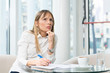 © Goran - Young businesswoman taking notes