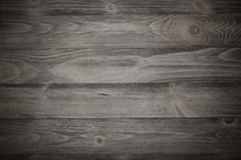 Old Weathered Wood Surface With Long Boards Lined Up. Wooden Planks On A Wall Or Floor With Grain And Texture. Dark Neutral Tones With Contrast.