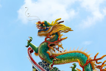 Chinese Dragon On Temple Rooftop