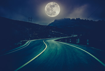Wall Mural - Landscape of nighttime with curvy roadway at national park. Cross process.