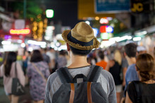 Young Asian Traveling Backpacker In Khaosan Road Night Market