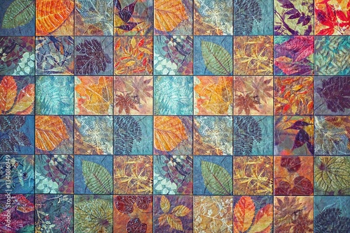 Fototapeta na wymiar Old wall ceramic tiles patterns handcraft from thailand parks public.