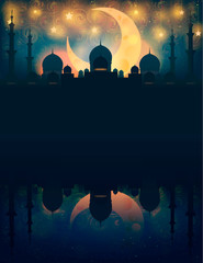 Mosque silhouette in night sky with crescent moon and star