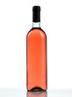 Bottle of rose wine on a white background