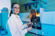 Beautiful Woman Scientist in her lab performing Chemistry experiments