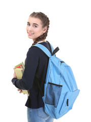 Wall Mural - Pretty teenager girl with books on white background