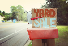 Yard Sale Sign On A Mailbox