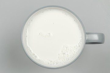 top view of glass milk / Glass of Milk From Above / gray tone