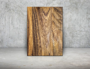 Leinwandbilder - Blank wood block frame leaning at grunge grey concrete wall and
