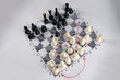 Leinwandbild Motiv White strategy board with chess figures on it. Plan of battle