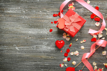 Canvas Print - St. Valentines Day concept. Gift box and decorations on wooden table