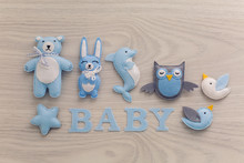 Collection Of Soft Toys And The Word Baby