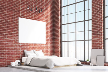 Corner of a bedroom with brick walls