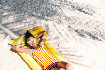 Wall Mural - Girl chilling on tropical island