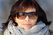 © ArtushFoto - woman with sunglasses without makeup in winter time