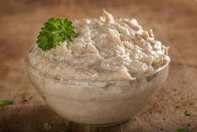 Bowl Filled With Cream Made By Tuna Fish, Butter And Onion Over