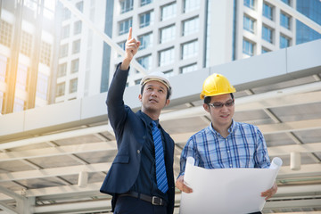 businessman worker handshaking on construction site