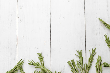 background rosemary on a wooden table