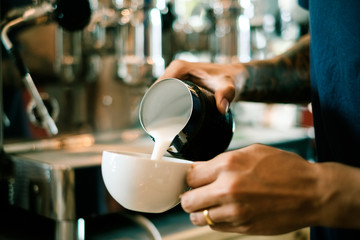 Wall Mural - Baristas are coffee,by tattooed barista arm