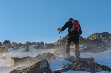 Man doing a trekking high in the mountains in Poland.