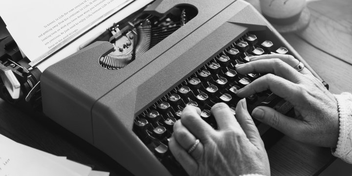 Senior Man Typing Typewriter Vintage Style Concept