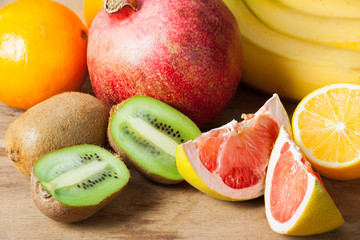 Ripe fresh fruits on wood desk