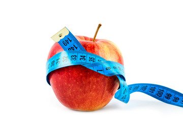 Fresh apple with measuring tape 