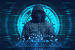© Leo Lintang - Hooded man with mask typing on keyboard virtual