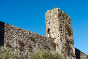 Detail of fortified medieval village of Monteriggioni. Siena, Tuscany, Italy