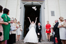 Happy Wedding Couple Puts In The Air Doves After Wedding Registr