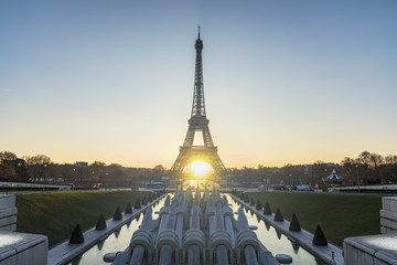 Wall Mural - Landscape view of a warm sunrise over Paris and in the middle of the Eiffel tower