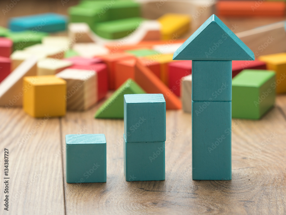 increasing arrow made by building blocks Stock Photo | Adobe Stock