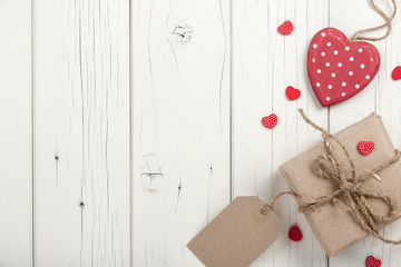 Canvas Print - Valentine's day background with hearts and gift box