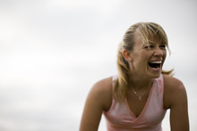 Teenage Girl Laughing While Outside.