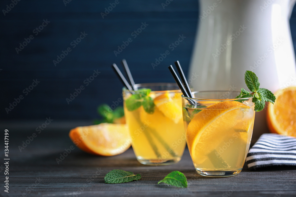 Two glasses with fresh lemonade on table