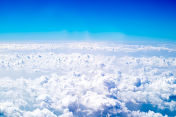 Wall Mural - aerial view of cloud and sky from airplane,traveling concept