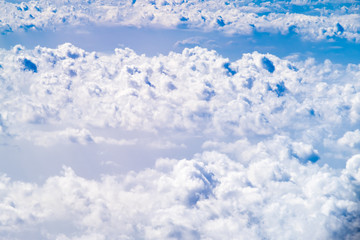 Wall Mural - aerial view of cloud and sky from airplane,traveling concept