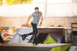 Man rollerblading in skatepark. Inline skater on blurred background. Generation of extreme.