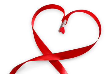 Wall Mural - red satin ribbon in heart shape, valentines day love concept.