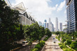 © Danila Shtantsov - Green city of the future. City of the future. Harmony of city and nature. Sunny day in the big city.