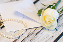 Beautiful White Rose String Of Pearls And Letter Envelope Love Valentine's Day Concept
