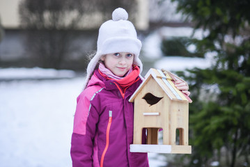 Girl wiht  nesting box