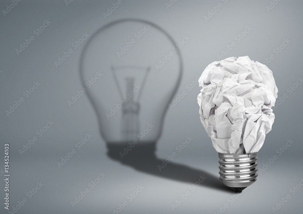 Bulb with crumpled paper and shadow, Idea creative concept - obrazy, fototapety, plakaty 